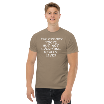 "Everybody poops, but not everyone really lives" printed on a brown savana unisex classic tee worn by a male