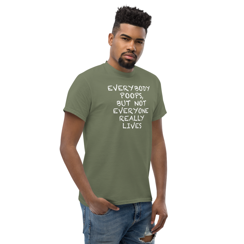 "Everybody poops, but not everyone really lives" printed on a military green unisex classic tee worn by a male