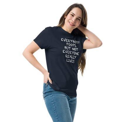 "Everybody poops, but not everyone really lives" printed on a navy unisex classic tee worn by a female