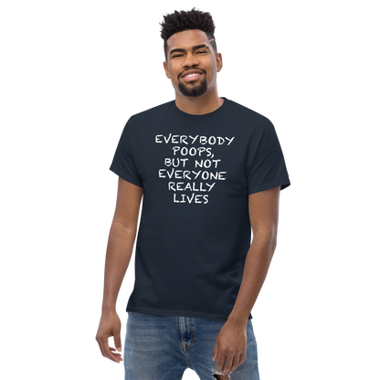 "Everybody poops, but not everyone really lives" printed on a navy unisex classic tee worn by a male