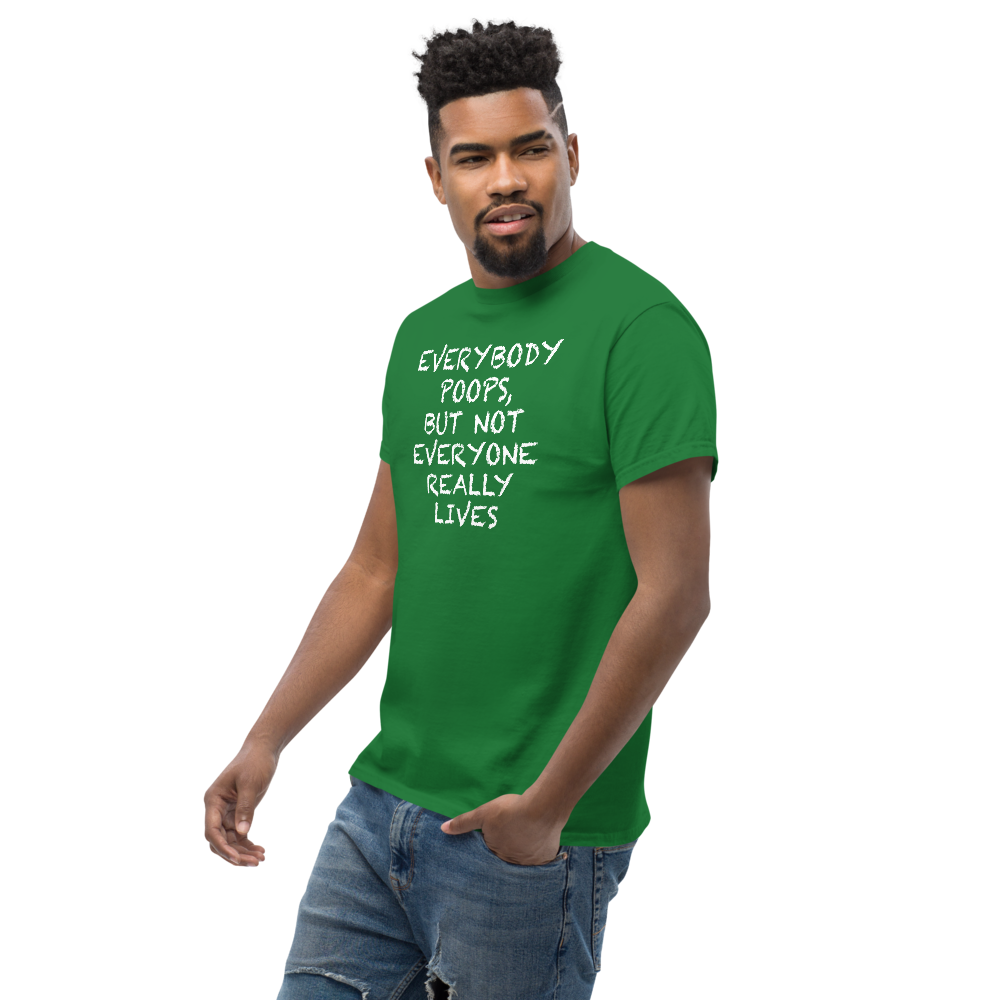 "Everybody poops, but not everyone really lives" printed on a turf green unisex classic tee worn by a male