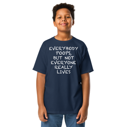 "Everybody poops, but not everyone really lives" printed on a navy youth classic tee worn by a male