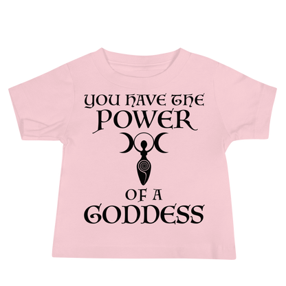 "You have the power of a goddess" printed on a pink baby jersey short sleeve tee laying on a flat surface