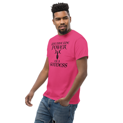 "You have the power of a goddess" printed on a heliconia unisex classic tee worn by a male