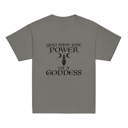 "You have the power of a goddess" printed on a charcoal youth classic tee laying on a flat surface