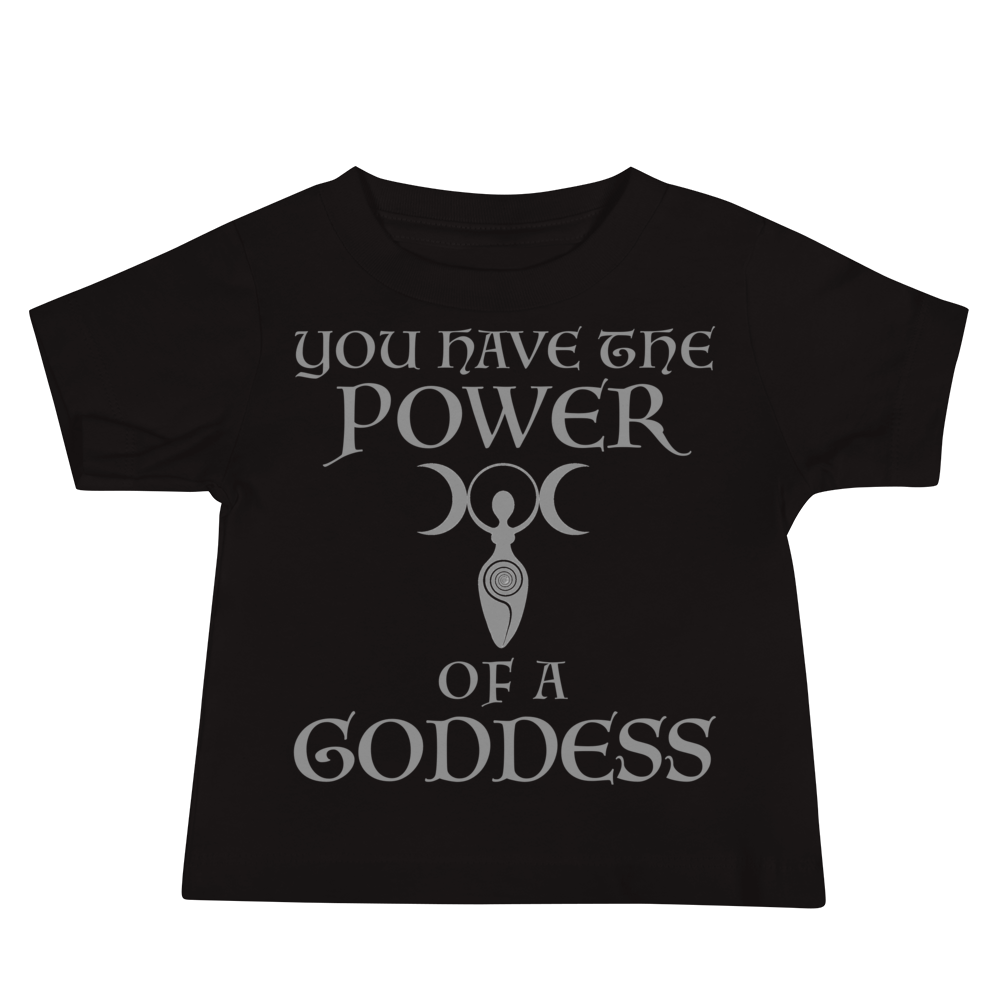 "You have the power of a goddess" printed on a black baby jersey short sleeve tee laying on a flat surface