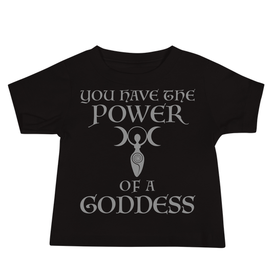 "You have the power of a goddess" printed on a black baby jersey short sleeve tee laying on a flat surface