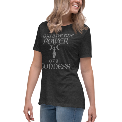 "You have the power of a goddess" printed on a dark grey heather women's relaxed t-shirt worn by a female