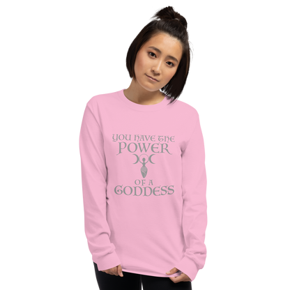 "You have the power of a goddess" printed on a light pink men's long sleeve shirt worn by a female