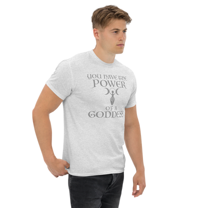 "You have the power of a goddess" printed on a ash unisex classic tee worn by a male