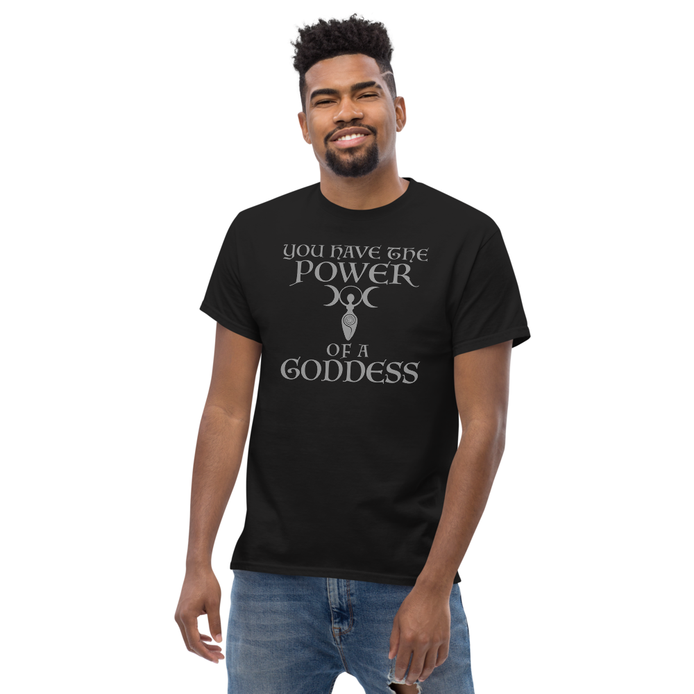 "You have the power of a goddess" printed on a black unisex classic tee worn by a male