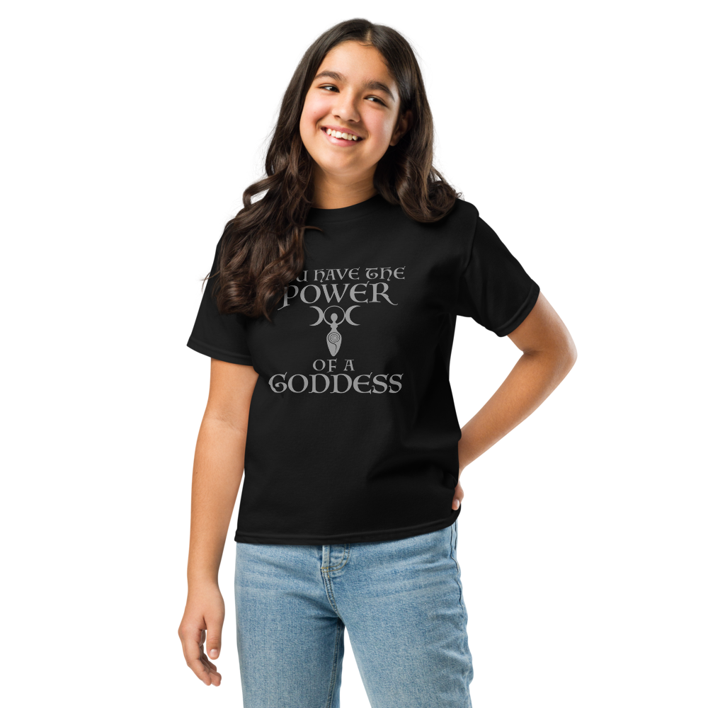 "You have the power of a goddess" printed on a black youth classic tee worn by a female