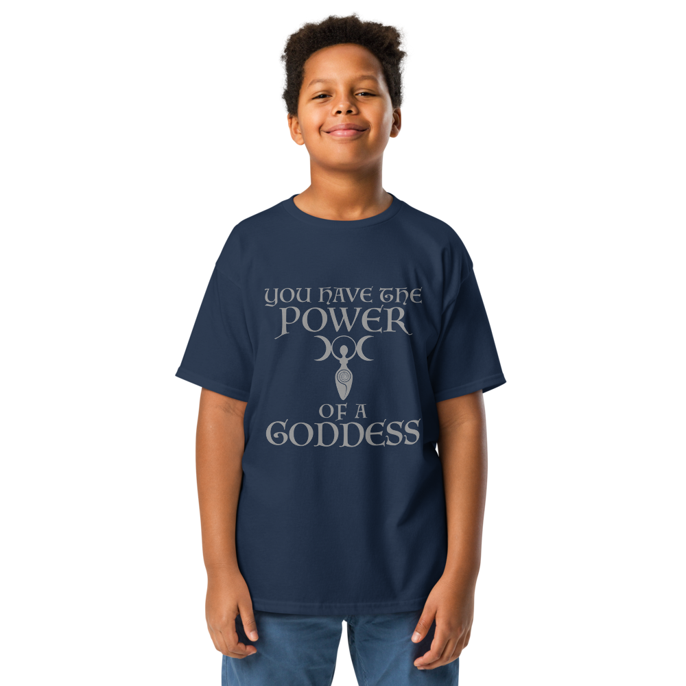 "You have the power of a goddess" printed on a navy youth classic tee worn by a male