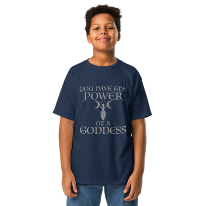 "You have the power of a goddess" printed on a navy youth classic tee worn by a male