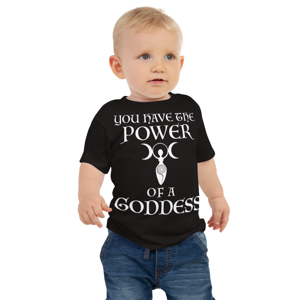 "You have the power of a goddess" printed on a black baby jersey short sleeve tee worn by a male