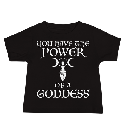 "You have the power of a goddess" printed on a black baby jersey short sleeve tee laying on a flat surface