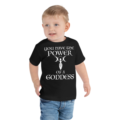 "You have the power of a goddess" printed on a black toddler short sleeve tee worn by a male