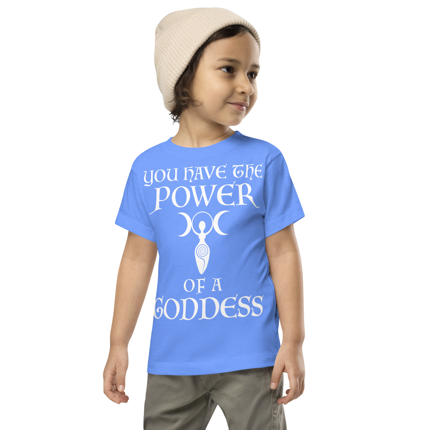 "You have the power of a goddess" printed on a heather columbia blue toddler short sleeve tee worn by a male wearing a cap