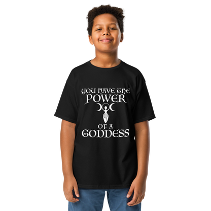 "You have the power of a goddess" printed on a black youth classic tee worn by a male