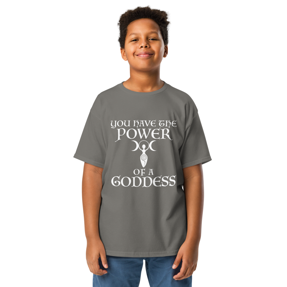 "You have the power of a goddess" printed on a charcoal youth classic tee worn by a male