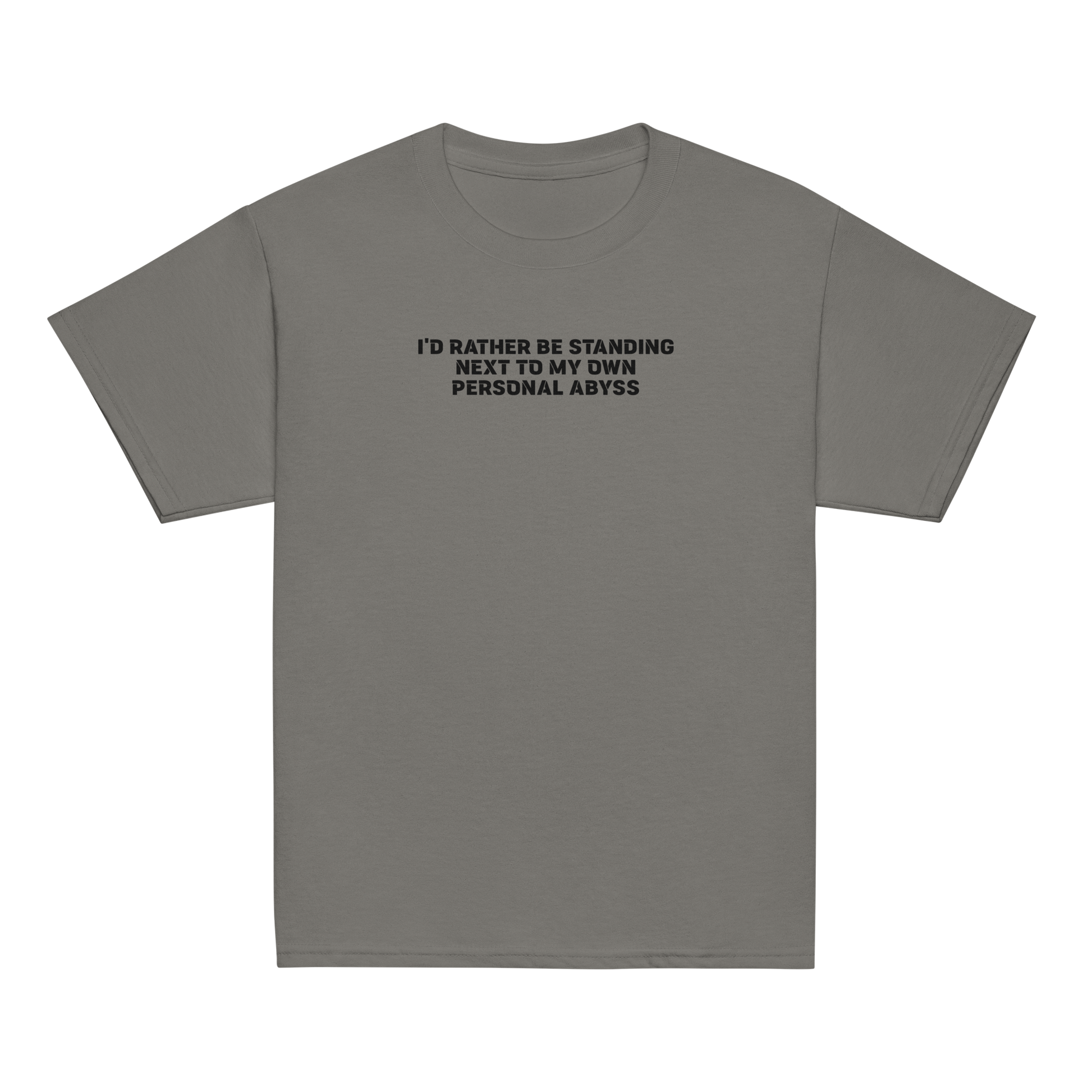 "I'd rather be standing next to my own personal abyss" printed on a charcoal youth classic tee laying on a flat surface