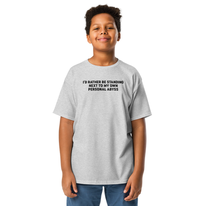 "I'd rather be standing next to my own personal abyss" printed on a sport grey youth classic tee worn by a male