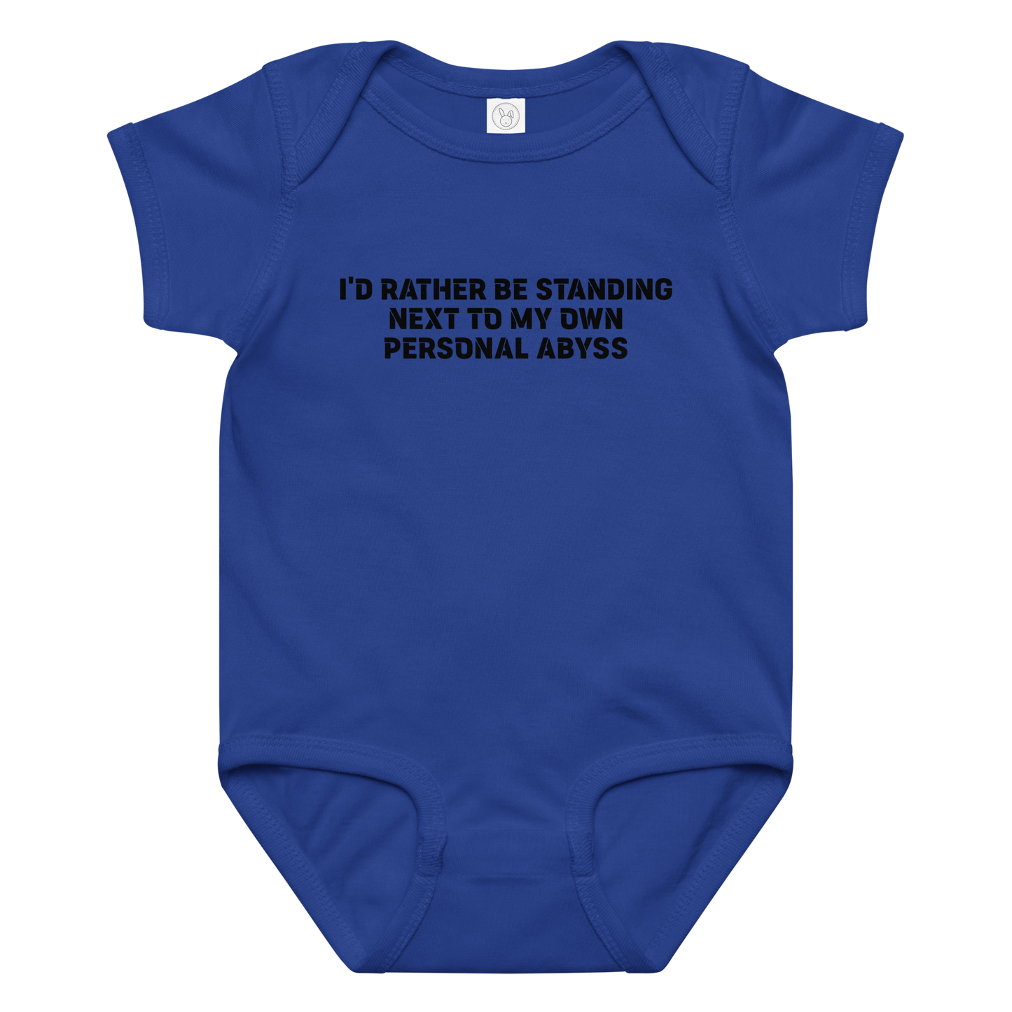 "I'd rather be standing next to my own personal abyss" printed on a royal baby jersey bodysuit laying on a flat surface amongst other clothes