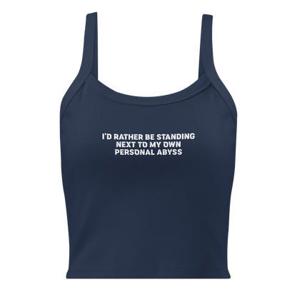 "I'd rather be standing next to my own personal abyss" printed on a solid navy blend women's micro-rib tanktop laying on a flat surface