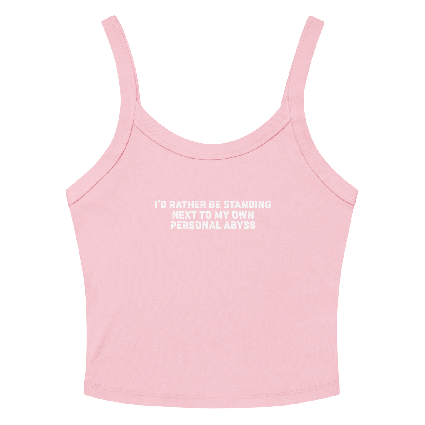 "I'd rather be standing next to my own personal abyss" printed on a solid pink blend women's micro-rib tanktop laying on a flat surface amongst sunglasses and shorts