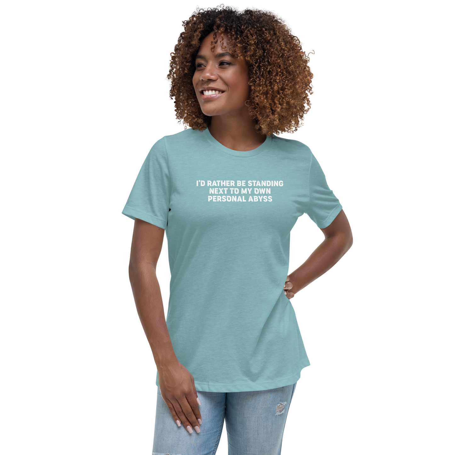 "I'd rather be standing next to my own personal abyss" printed on a heather blue lagoon women's relaxed t-shirt worn by a female
