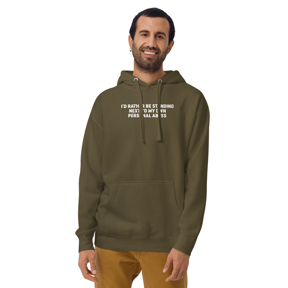 "I'd rather be standing next to my own personal abyss" printed on a military green warn by a male