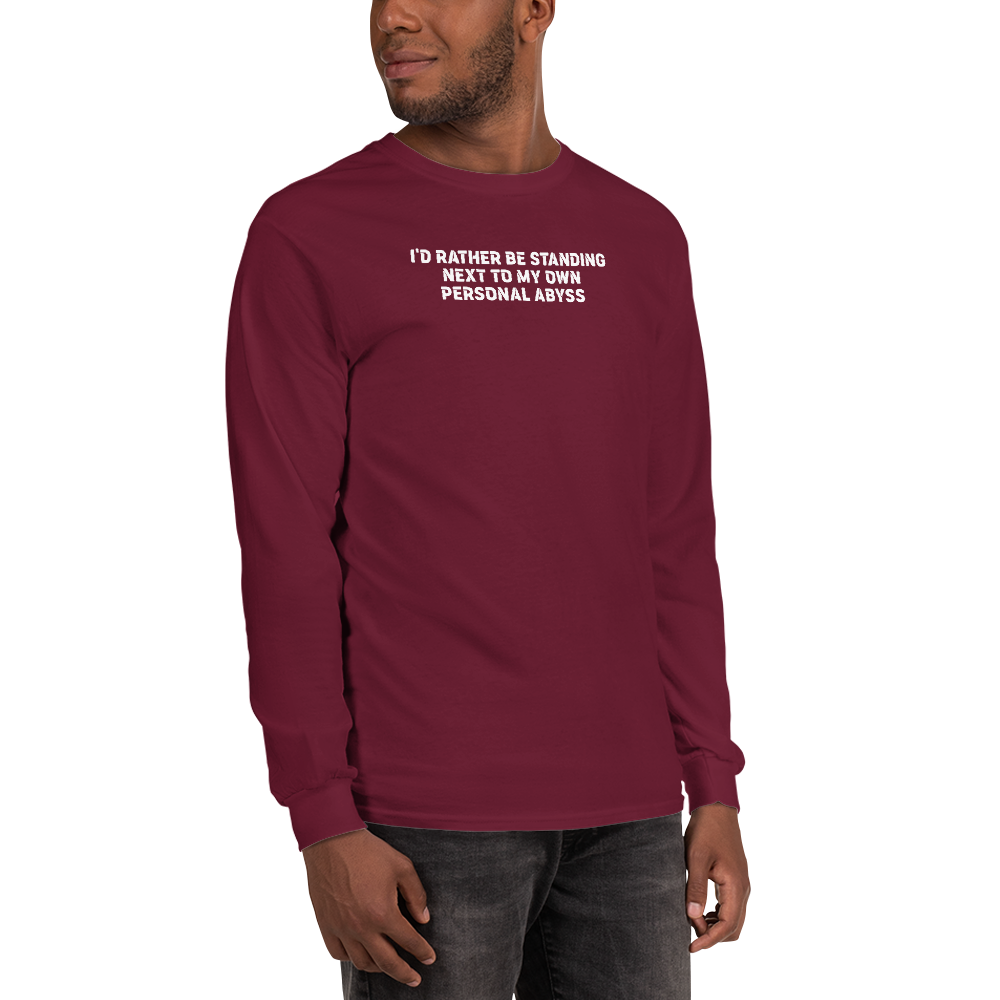 "I'd rather be standing next to my own personal abyss" printed on a maroon men's long sleeve shirt worn by a male