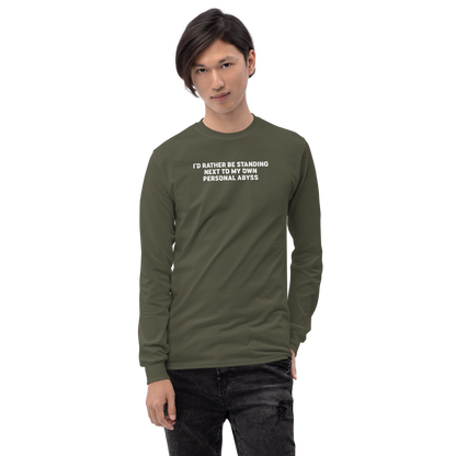 "I'd rather be standing next to my own personal abyss" printed on a military green men's long sleeve shirt worn by a male