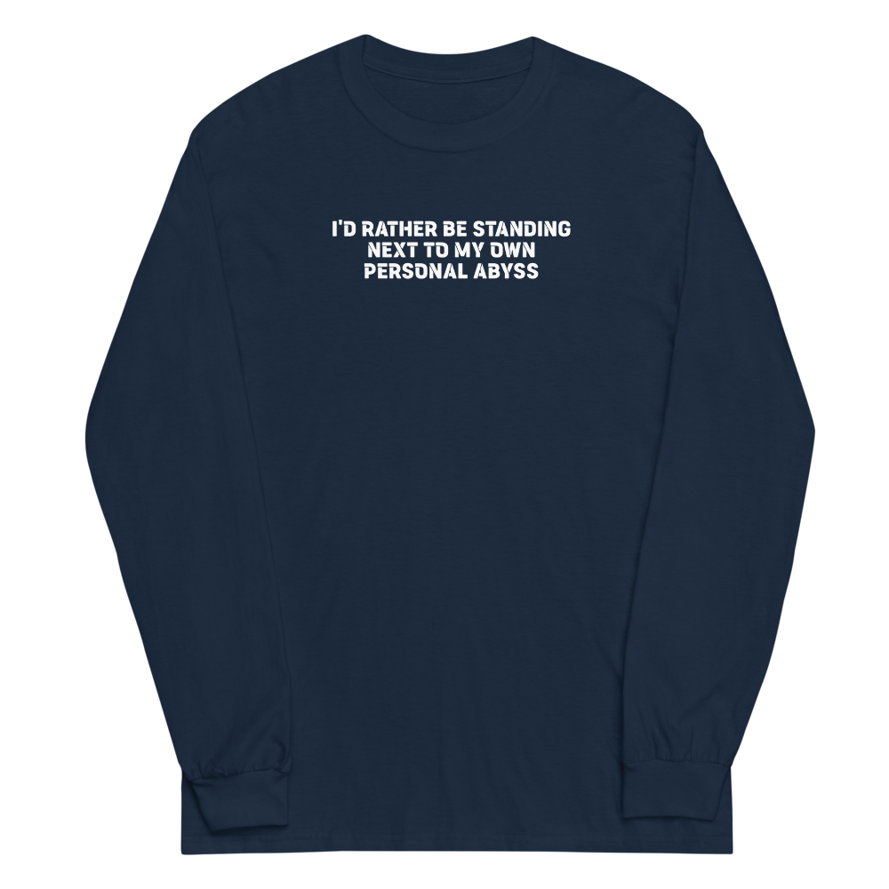 "I'd rather be standing next to my own personal abyss" printed on a navy men's long sleeve shirt laying on a flat surface