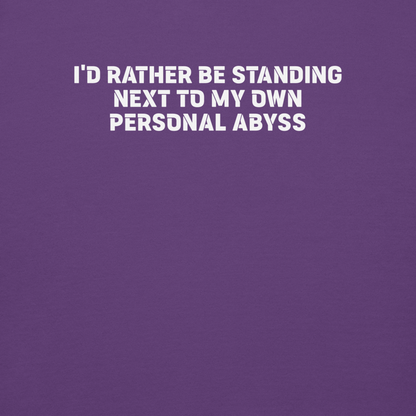 "I'd rather be standing next to my own personal abyss" printed on a purple background