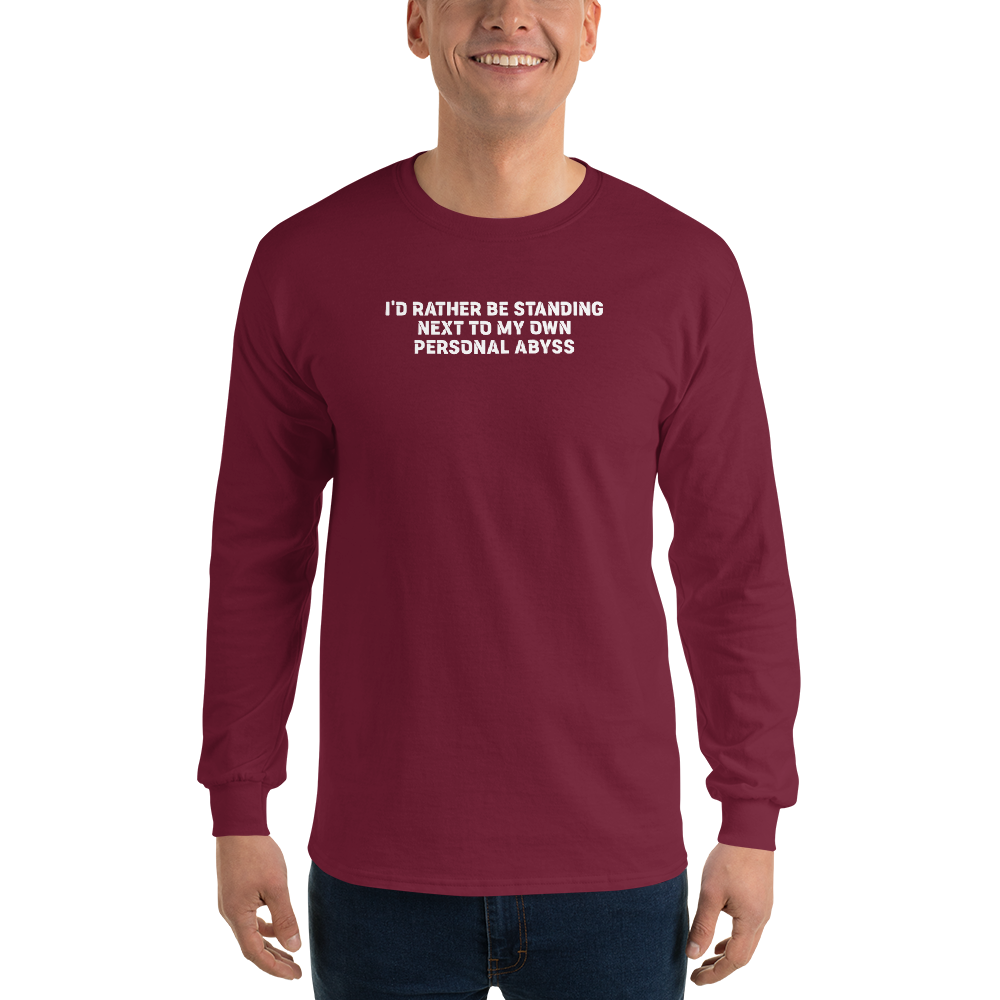 "I'd rather be standing next to my own personal abyss" printed on a maroon men's long sleeve shirt worn by a male