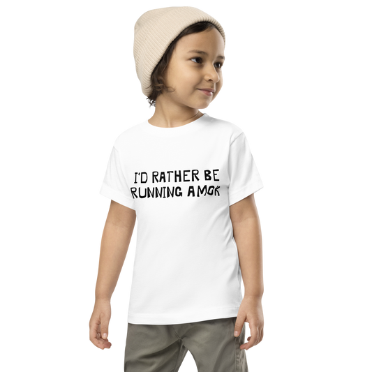 "I’d rather be running amok" printed on a white toddler short sleeve tee worn by a male wearing a cap