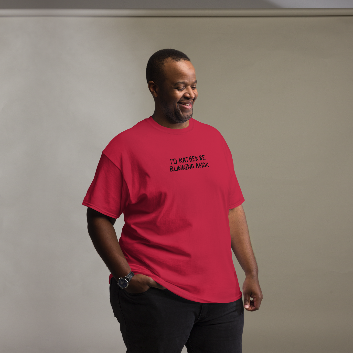 "I’d rather be running amok" printed on a cardinal unisex classic tee worn by a male
