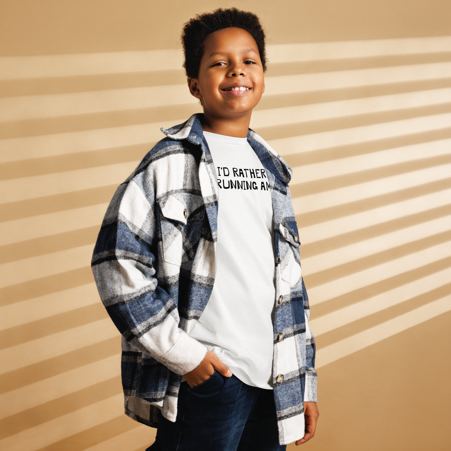 "I’d rather be running amok" printed on a white youth classic tee worn by a male also wearing a jacket