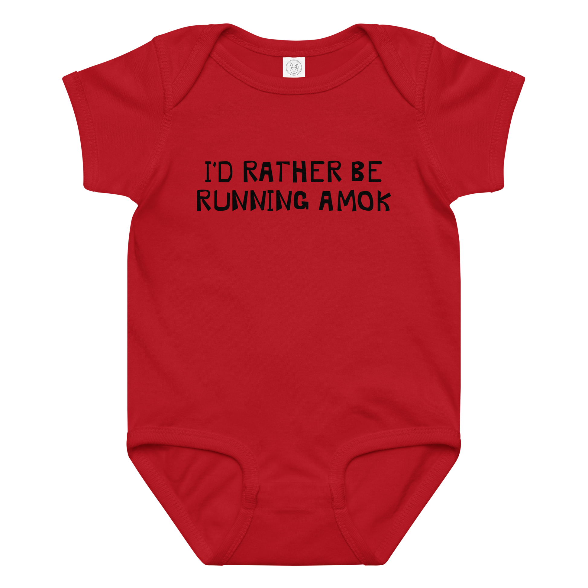"I’d rather be running amok" printed on a red baby jersey bodysuit laying on a flat surface amongst other clothes