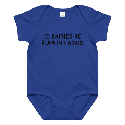 "I’d rather be running amok" printed on a royal baby jersey bodysuit laying on a flat surface amongst other clothes