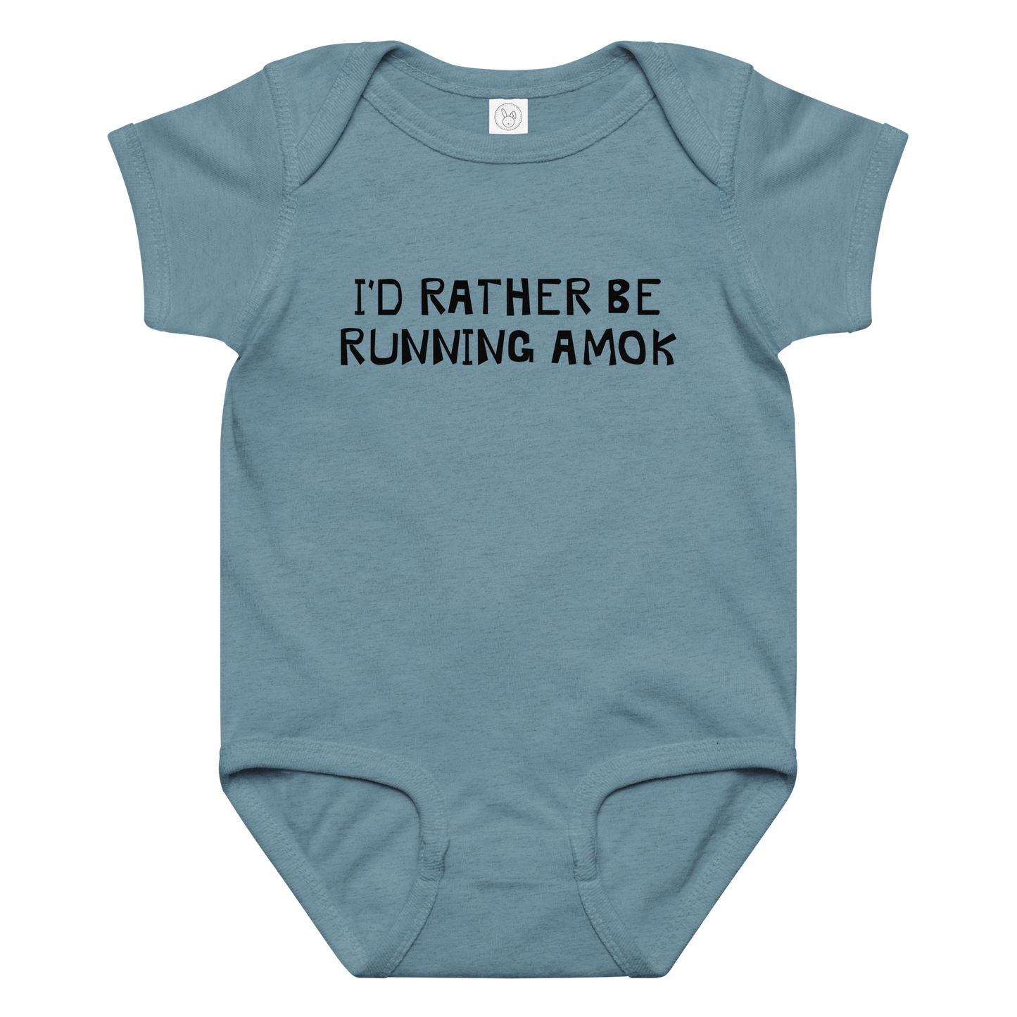 "I’d rather be running amok" printed on a vintage indigo baby jersey bodysuit laying on a flat surface amongst other clothes