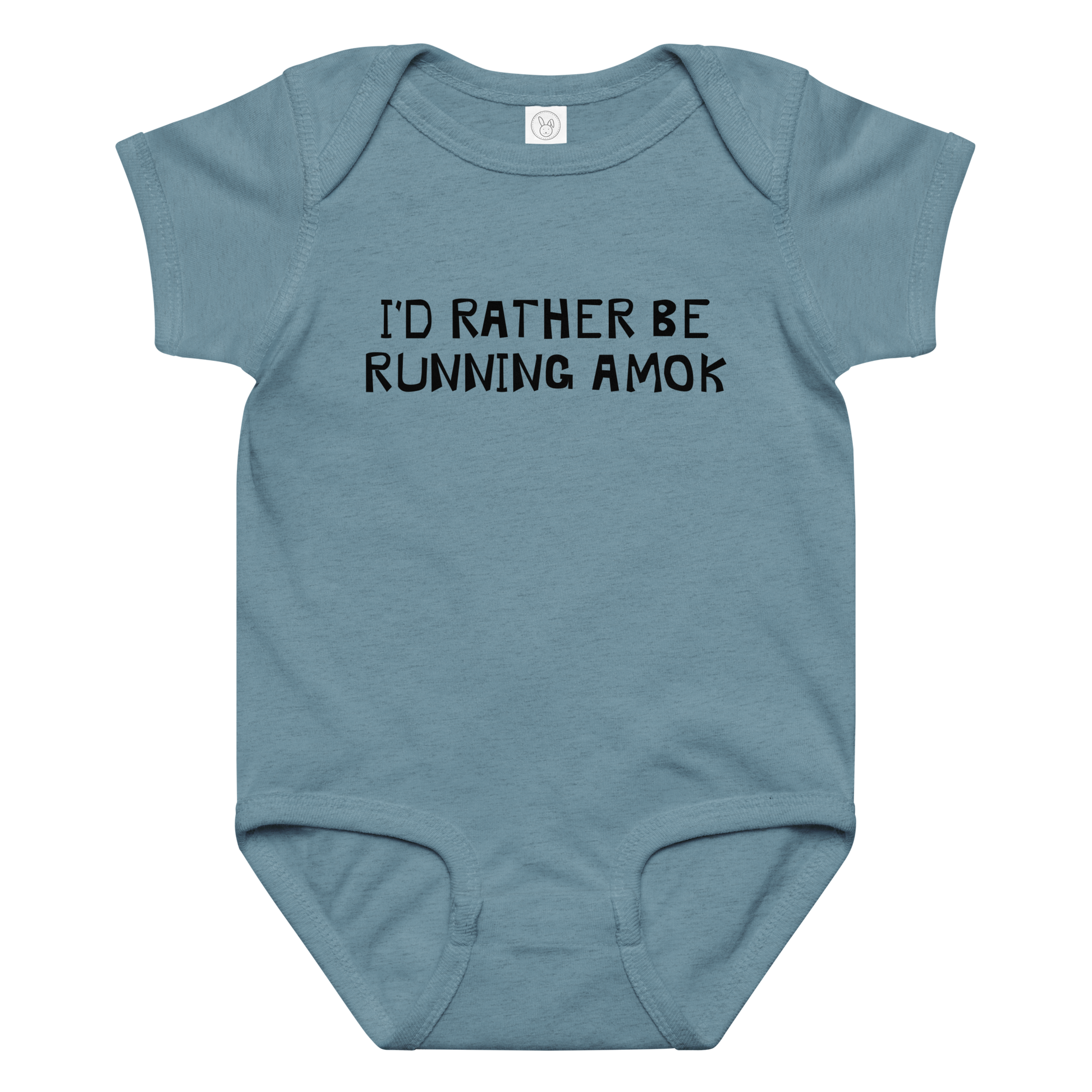 "I’d rather be running amok" printed on a vintage indigo baby jersey bodysuit laying on a flat surface amongst other clothes