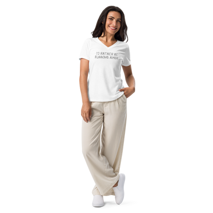 "I’d rather be running amok" printed on a solid white blend women's relaxed v-neck t-shirt worn by a female