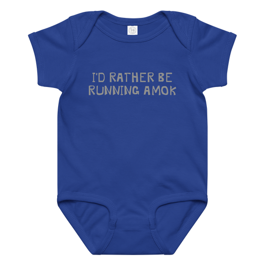 "I’d rather be running amok" printed on a royal baby jersey bodysuit laying on a flat surface amongst other clothes