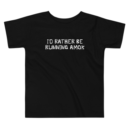 "I’d rather be running amok" printed on a black toddler short sleeve tee laying on a flat surface
