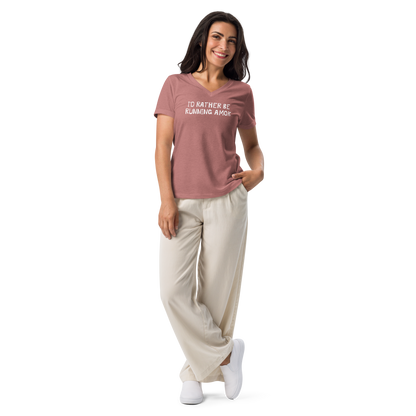 "I’d rather be running amok" printed on a heather mauve women's relaxed v-neck t-shirt worn by a female