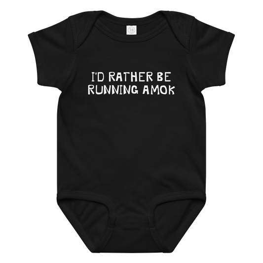 "I’d rather be running amok" printed on a black baby jersey bodysuit laying on a flat surface amongst other clothes