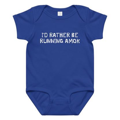 "I’d rather be running amok" printed on a royal baby jersey bodysuit laying on a flat surface amongst other clothes