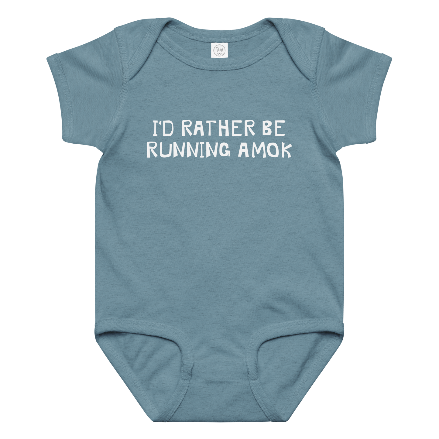 "I’d rather be running amok" printed on a vintage indigo baby jersey bodysuit laying on a flat surface amongst other clothes